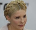 Тимошенко ответила Кузьмину, что меха - профиль Януковича