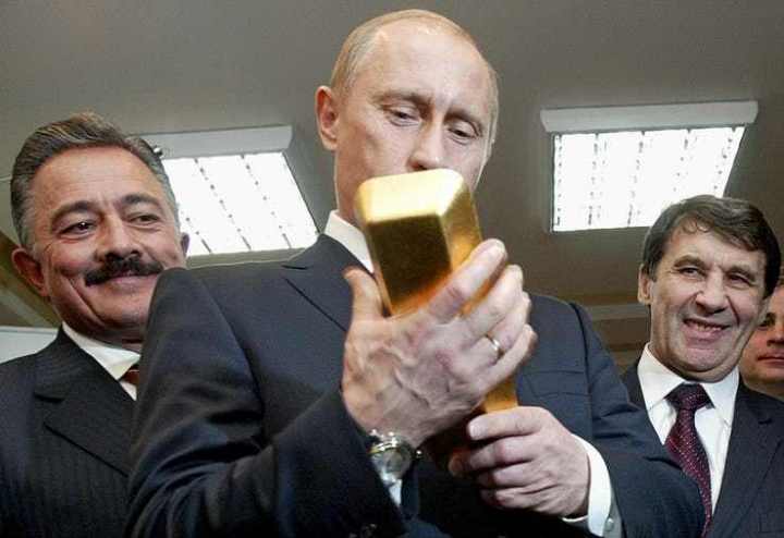 Путин слиток золота