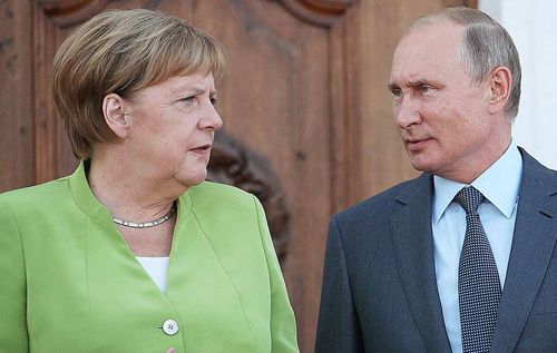 Меркель і Путін відзначили прогрес у переговорах про транзит газу через Україну