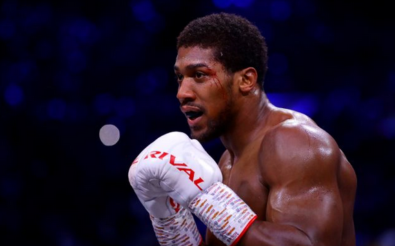 Джошуа сфотографувався з прапором України та логотипом одного з спецпідрозділів ГУР